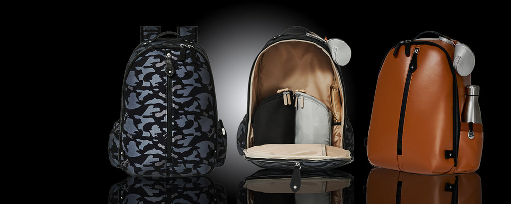 backpack diaper bag in camo and tan showing the inside that holds two organising pods to keep you in control of your stuff at all times