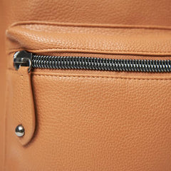 Close up of the zip and part of the front pocket on a Hartland Pack Oak